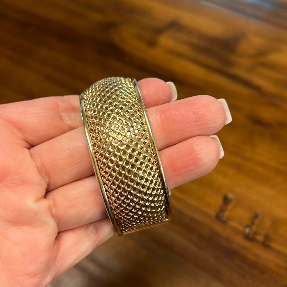 Gold toned bangle bracelet